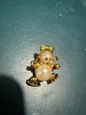 Avon Gold Tone Pearl Doll Brooch
